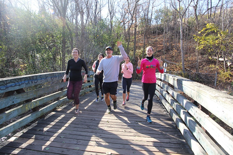 Students and faculty on a run in the nearby Don Trail