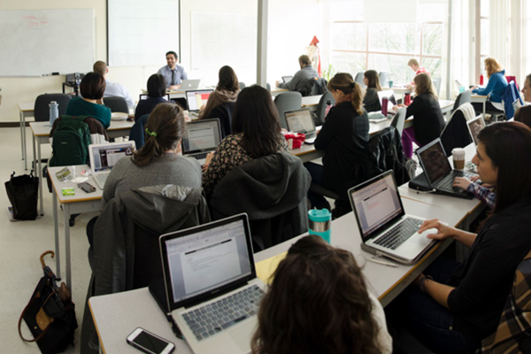 Students in a classroom on their laptops